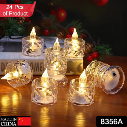 Six clear acrylic flameless LED tealight candles with warm yellow light, some on a book, against a festive background.