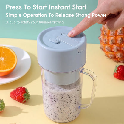 A hand presses the power button on a light blue portable blender containing a white chia seed drink.