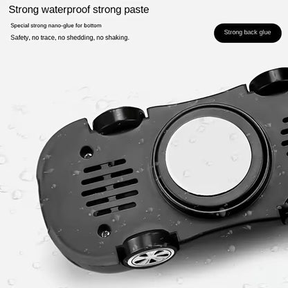 The black underside of the car-shaped phone holder shows a circular adhesive pad and text about strong glue.