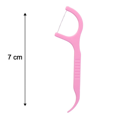 A single pink dental floss pick with a 7 cm measurement indicated by a vertical arrow on a white background.