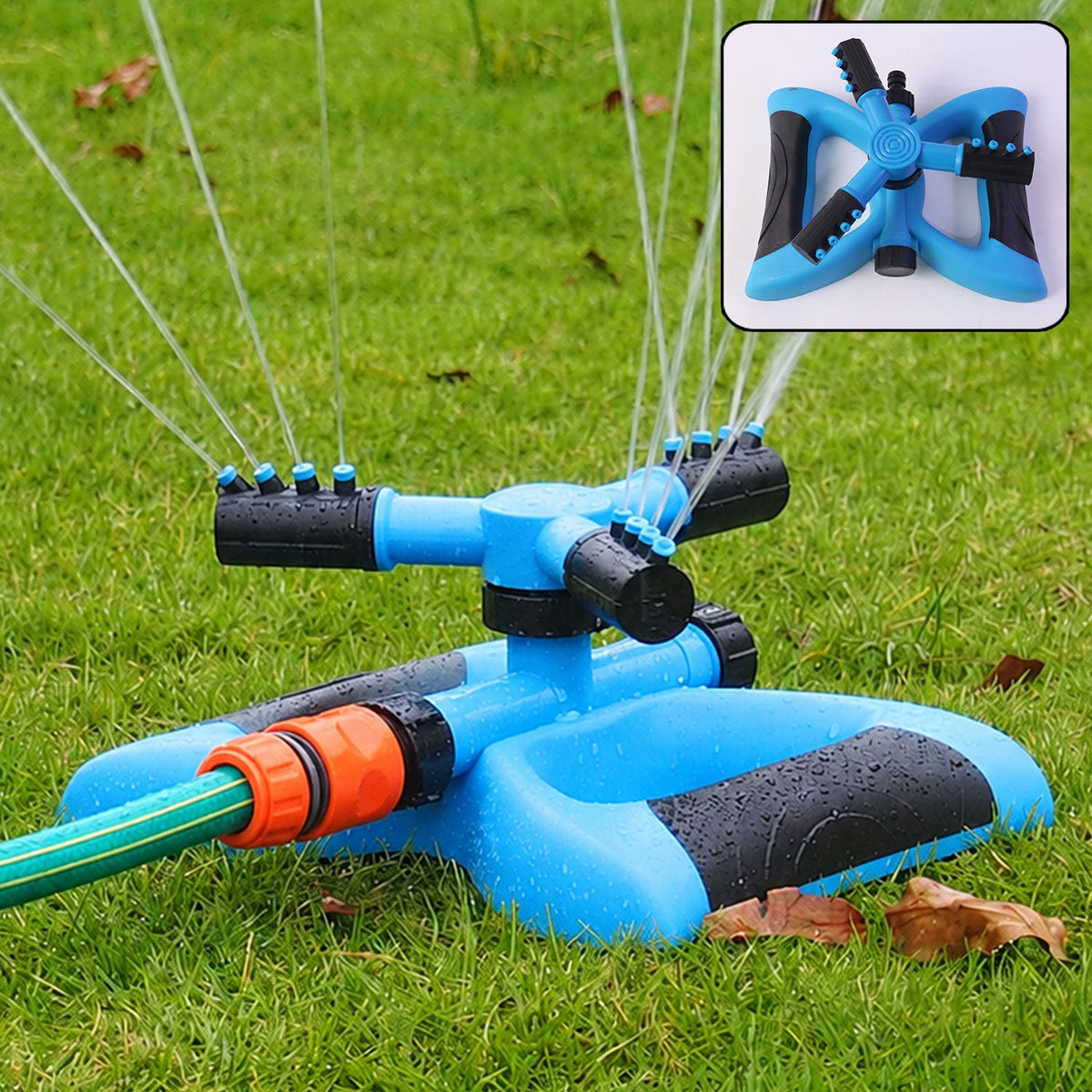 A blue and black sprinkler with three rotating arms sprays water onto green grass, with a close-up inset.
