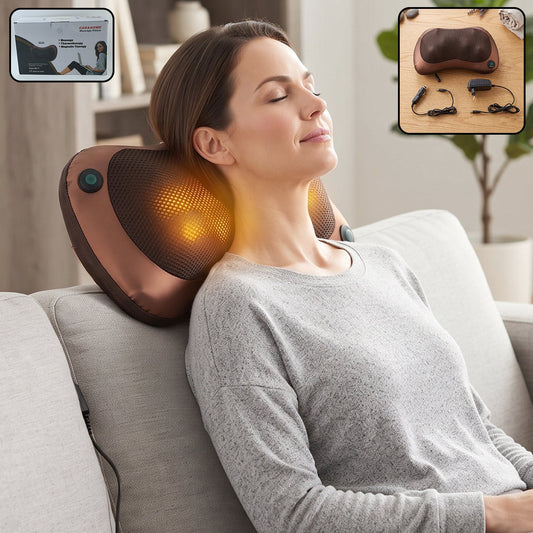A woman with closed eyes relaxes on a couch, using a brown massage pillow with glowing orange lights on her neck.
