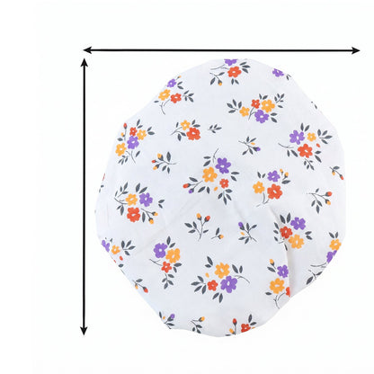 White elasticated food cover with colorful floral print, showing approximate dimensions with arrows.