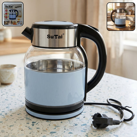 A light blue and clear glass electric kettle with a black handle and power cord on a speckled countertop.