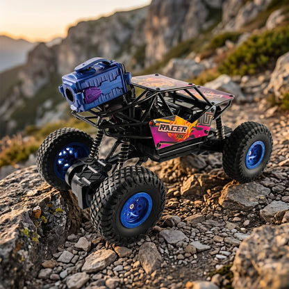 A black and purple remote control rock crawler with a blue camera-like attachment on top navigates a rocky outdoor terrain.