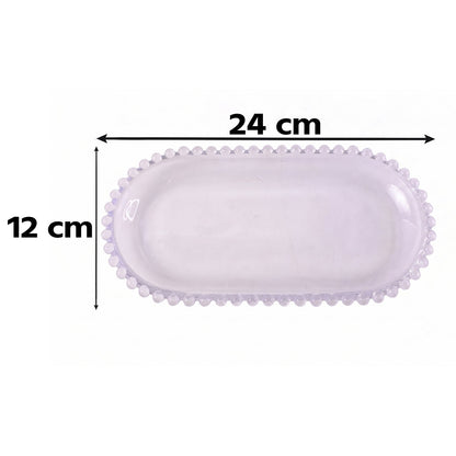 A clear oval glass tray with a beaded edge displays its dimensions: 24 cm length and 12 cm width.