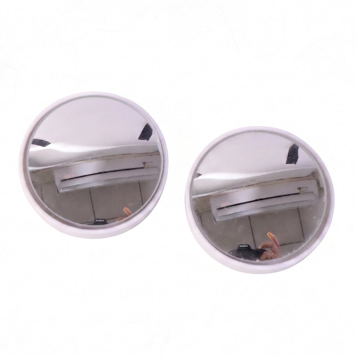 Two identical round convex blind spot mirrors with white frames on a plain white background.