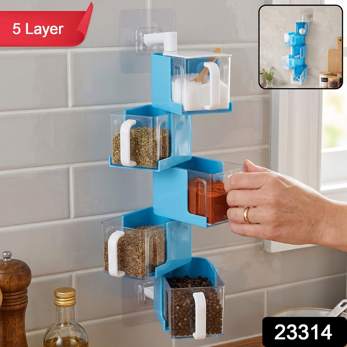 A blue 5-layer rotating spice rack on a tiled wall, with a red '5 Layer' label and product number '23314'.