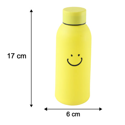 A yellow glass water bottle with a smiley face, showing its dimensions of 17 cm height and 6 cm width.