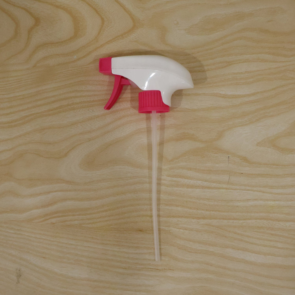 Live photo of pink spray nozzle trigger head