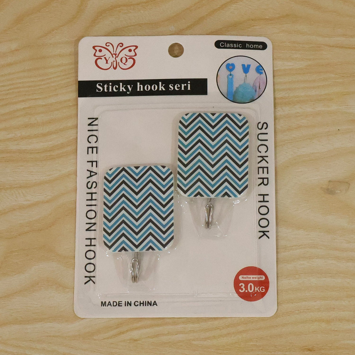 Packaging for the two self adhesive chevron pattern wall hooks