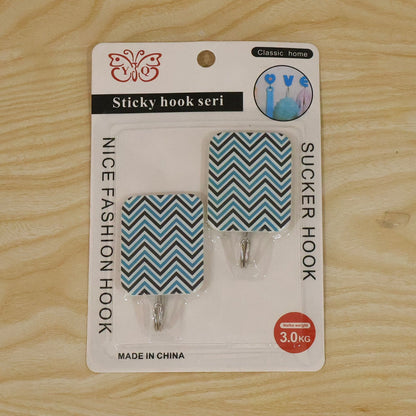 Packaging for the two self adhesive chevron pattern wall hooks
