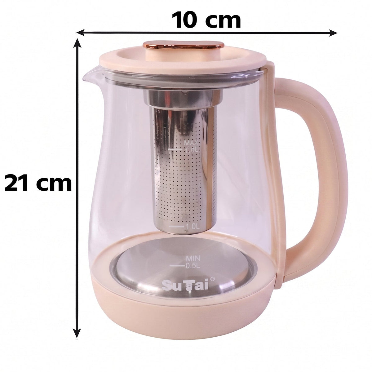 The light pink and clear glass electric kettle with a metal infuser sits on its base, plugged in, on a wooden surface.