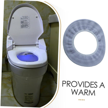 A modern white toilet with a blue light inside, next to a light grey elastic toilet seat cover and text.