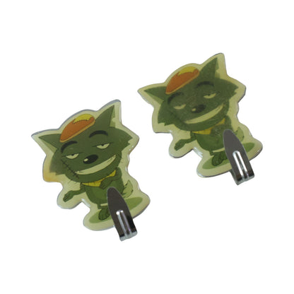 Two green cartoon goblin-like characters with hats, acting as wall hooks, against a white background.