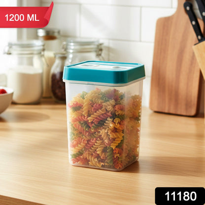 Clear plastic food storage container with teal lid filled with colorful pasta on a kitchen counter, with 1200 ML and 11180