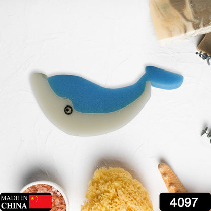 The blue and white dolphin sponge is centered on a white surface with bath items, including a "Made in China" label.