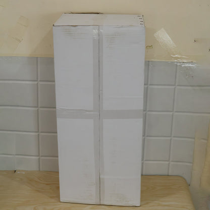 A tall, rectangular cardboard box sealed with tape, resting on a light wooden surface against a white tiled wall.