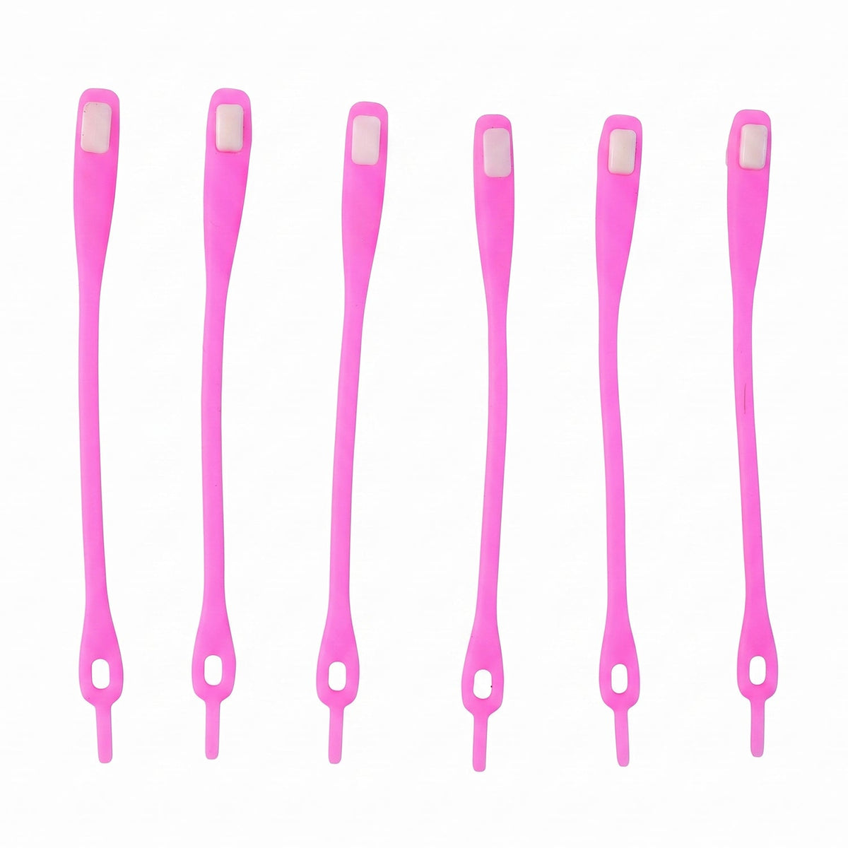 Six individual bright pink silicone no-tie shoelaces with white clasps, arranged vertically on a white background.