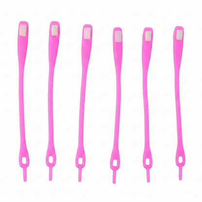 Six individual bright pink silicone no-tie shoelaces with white clasps, arranged vertically on a white background.