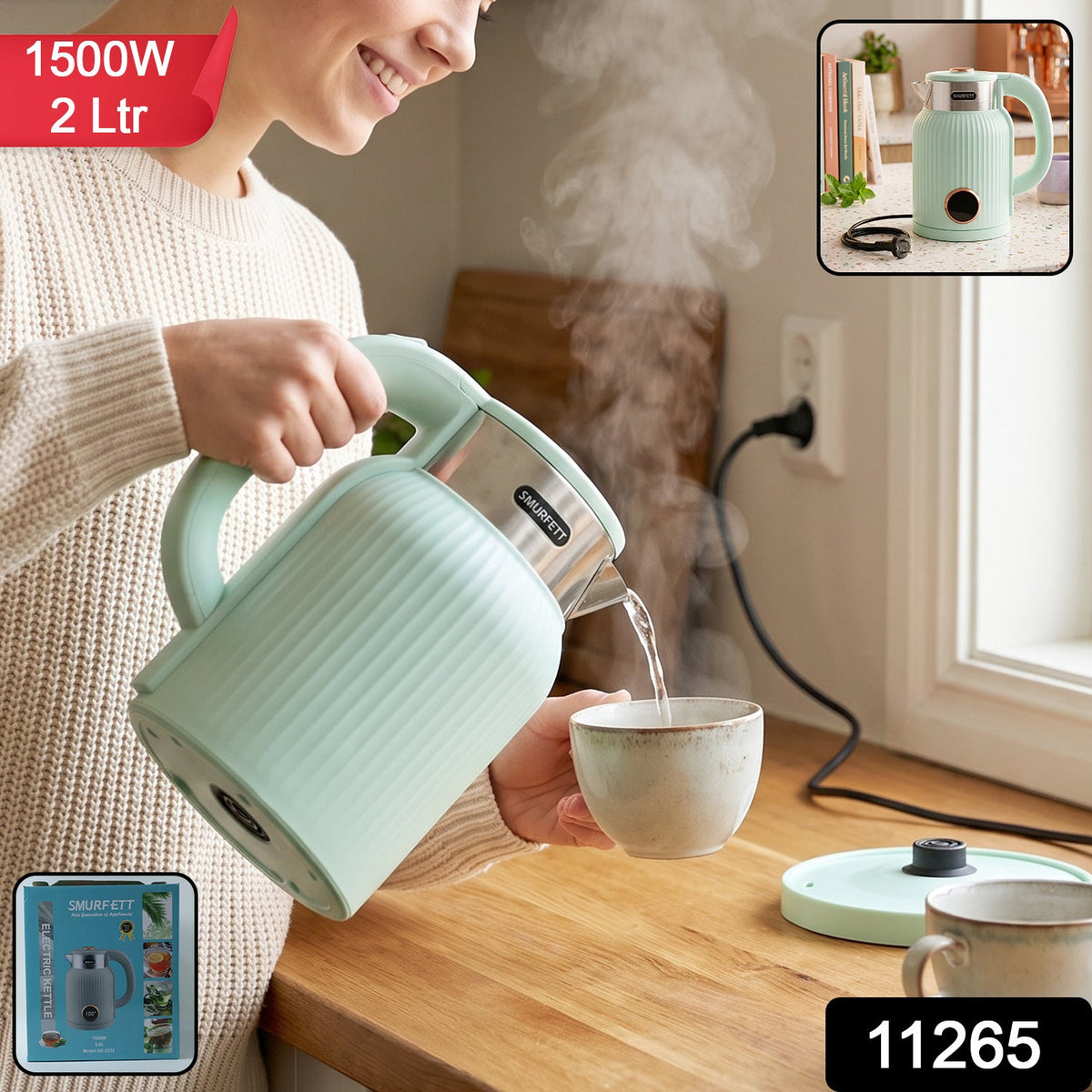 Close-up of a mint green electric kettle with a stainless steel band, a copper-colored knob, and steam rising from the spout.