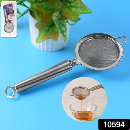 A stainless steel fine mesh strainer with a long handle is displayed on a bright blue surface, with an inset showing it in