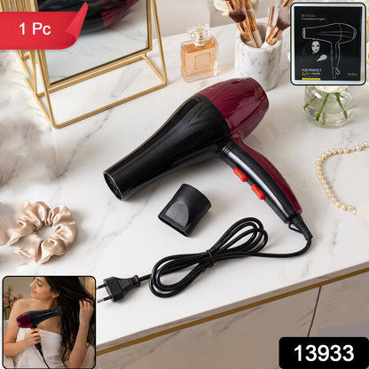 A red and black hair dryer and concentrator nozzle on a marble vanity, with text overlays '1 Pc' and '13933'.