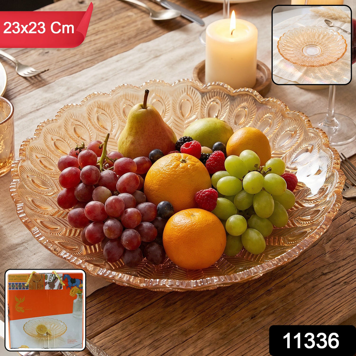 Amber glass platter with a peacock feather pattern, filled with various fresh fruits on a dining table. Red label shows