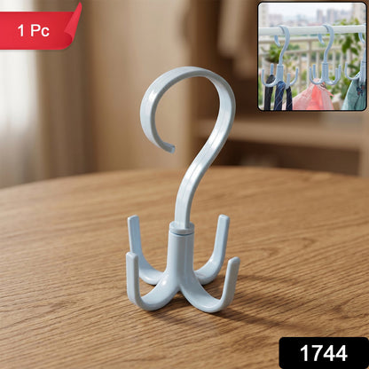 A light blue plastic rotating multi-hook hanger sits on a wooden table, with a red "1 Pc" label and an inset showing it