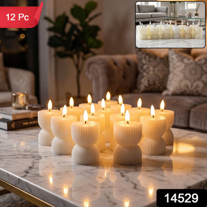 A dozen cream ribbed flameless candles with illuminated wicks sit on a marble surface, with a 12 Pc label.