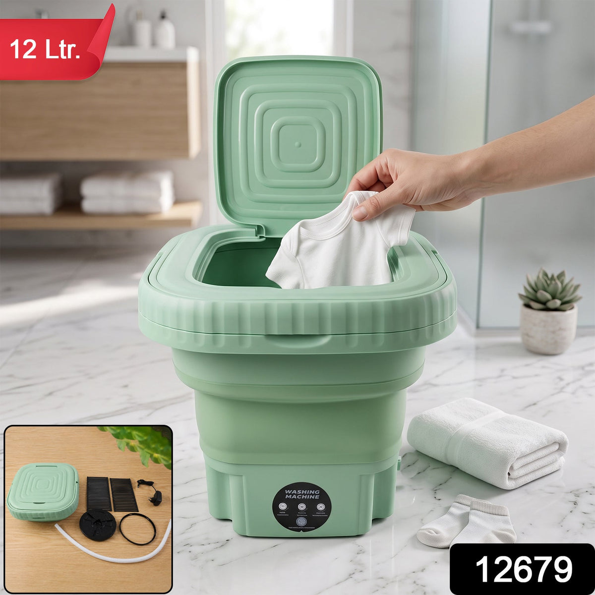 A person presses a button on the control panel of a green portable washing machine on a countertop with folded clothes