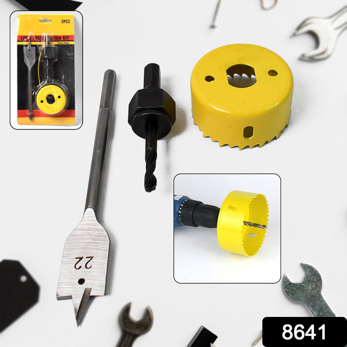 A yellow hole saw, a black drill bit, and a silver spade bit are displayed on a white background with tools.